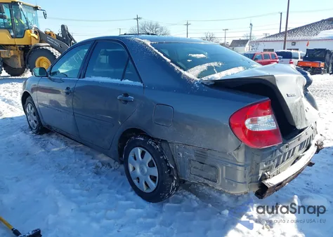 2002 Toyota Camry Le from USA, damaged, VIN 4T1BE32K32U628037